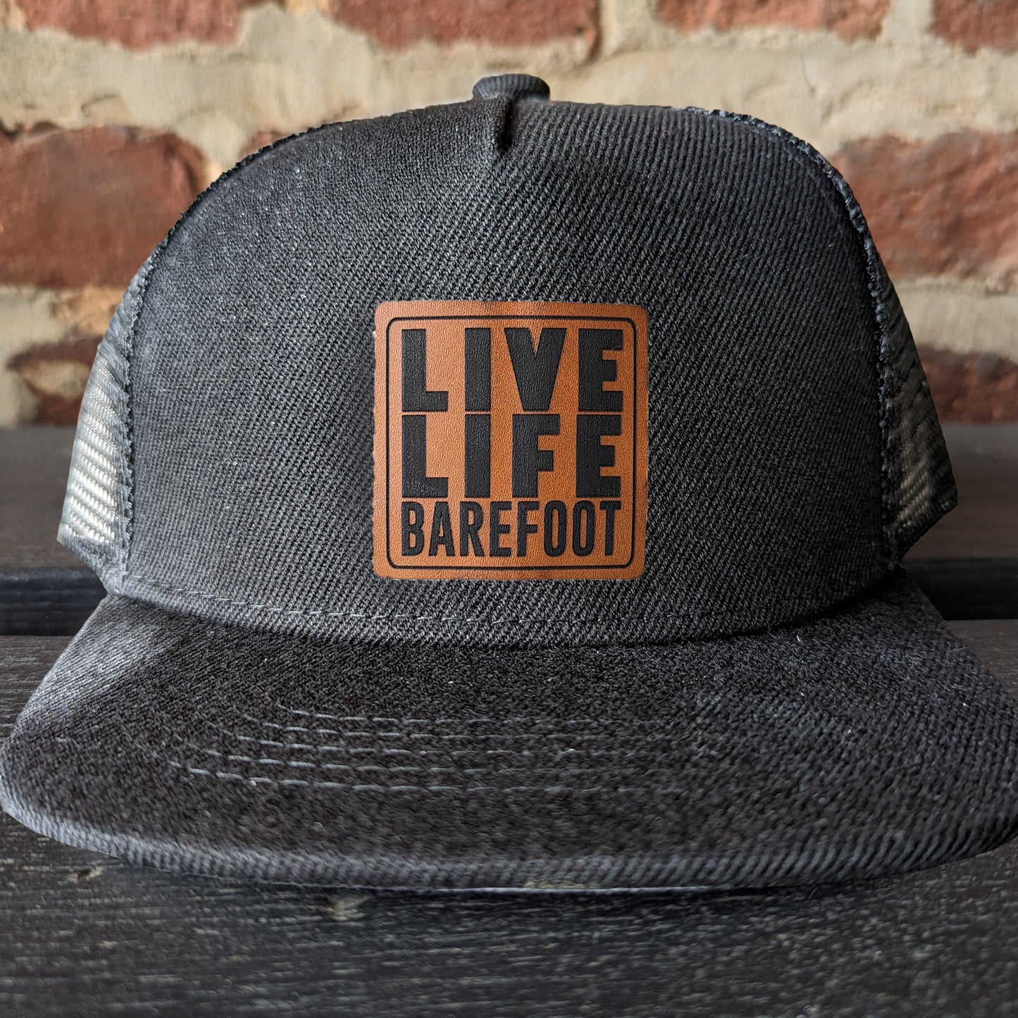 "Live Life Barefoot" Black mesh Adjustable Snapback hat with leather patch