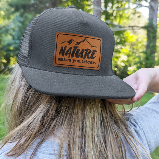 "Nature Makes you Nicer" Trucker Hat | FOUR Color