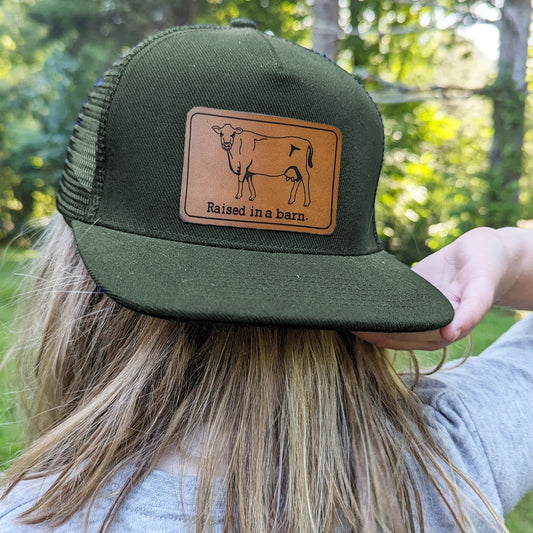 "Raised in a barn" Cow Trucker Hat | FOUR Color Options