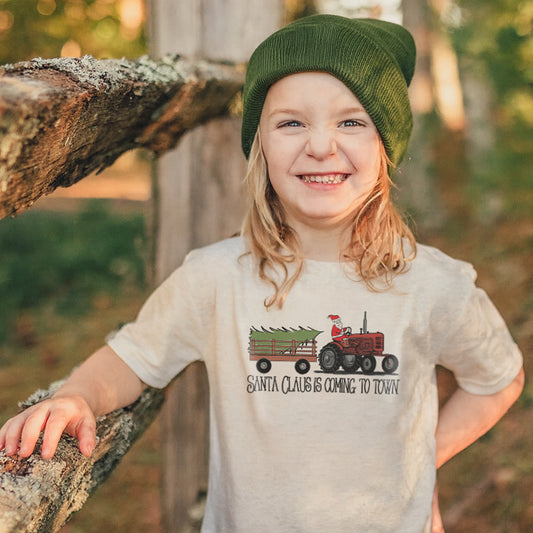 "Santa Claus is coming to town" Country Western Tractor Kid Christmas 2024 tee