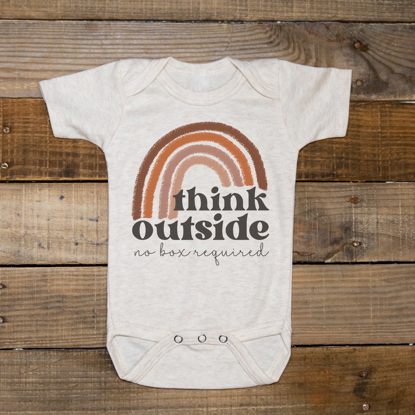 "Think outside no box required" Neutral Rainbow body suit